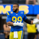 Los Angeles Rams defensive tackle Aaron Donald (99) warms up before an NFL football game against the Carolina Panthers Sunday, Oct. 16, 2022, in Inglewood, Calif.